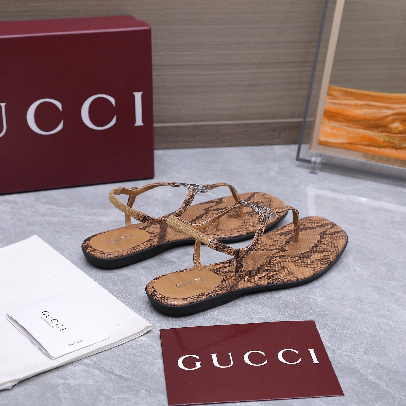 GUCCI 26S INTERLOCKING G THONG SANDALS IN BROWN PYTHON PRINT CALFSKIN