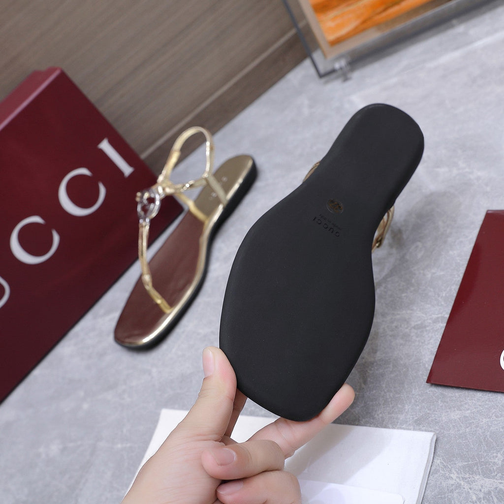 GUCCI 26S INTERLOCKING G THONG SANDALS IN GOLD CALFSKIN