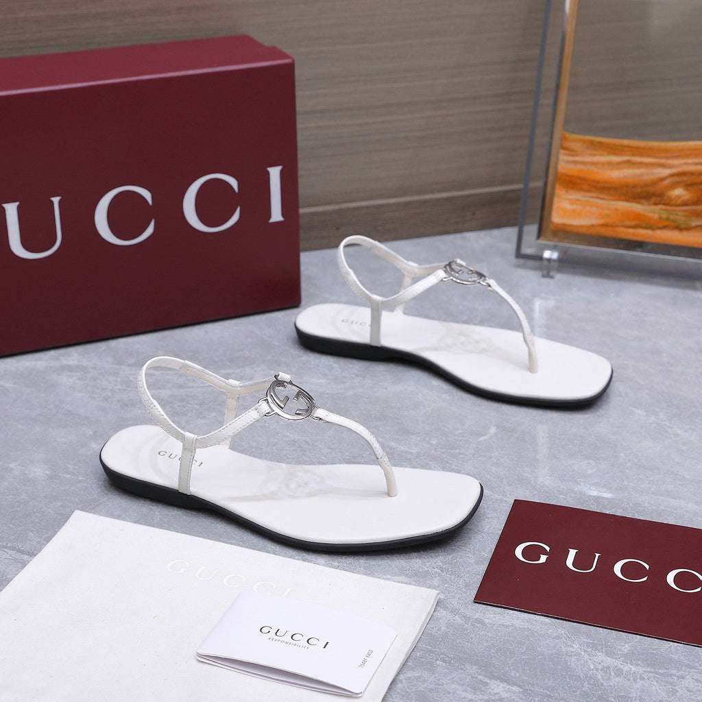 GUCCI 26S INTERLOCKING G THONG SANDALS IN WHITE CALFSKIN