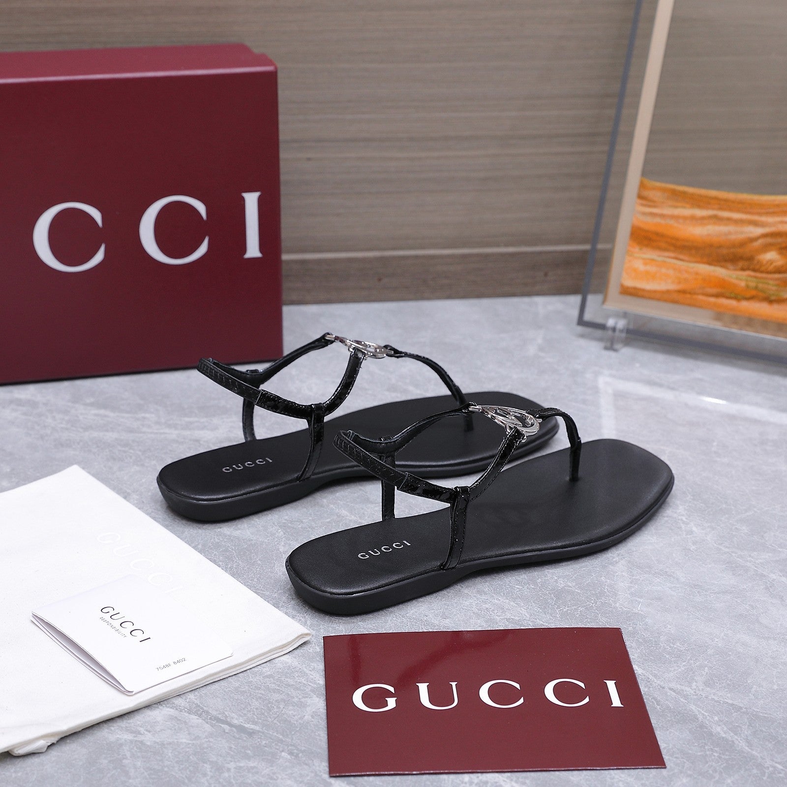 GUCCI 26S INTERLOCKING G THONG SANDALS IN BLACK CALFSKIN