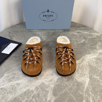 PRADA 26S WOVEN MULES IN COGNAC BROWN SUEDE