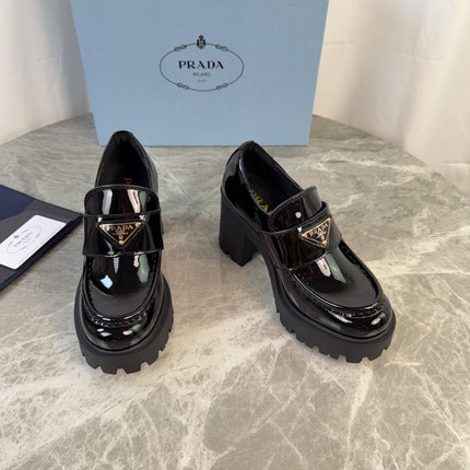PRADA 26S HEELED LOAFERS 85 MM IN BLACK PATENT CALFSKIN