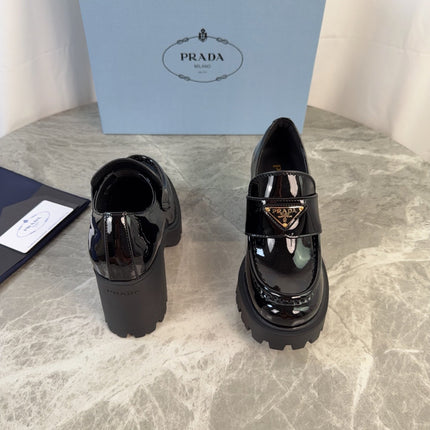 PRADA 26S HEELED LOAFERS 85 MM IN BLACK PATENT CALFSKIN