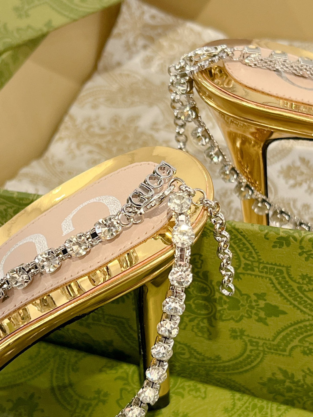 STRAPPY SANDAL WITH RHINESTONE CHAIN IN GOLD PATENT LEATHER
