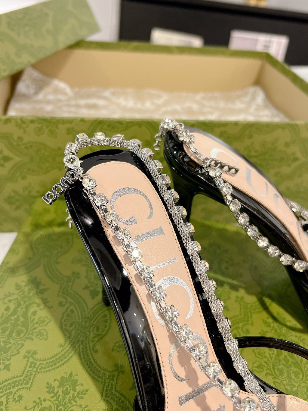 STRAPPY SANDAL WITH RHINESTONE CHAIN IN BLACK PATENT LEATHER