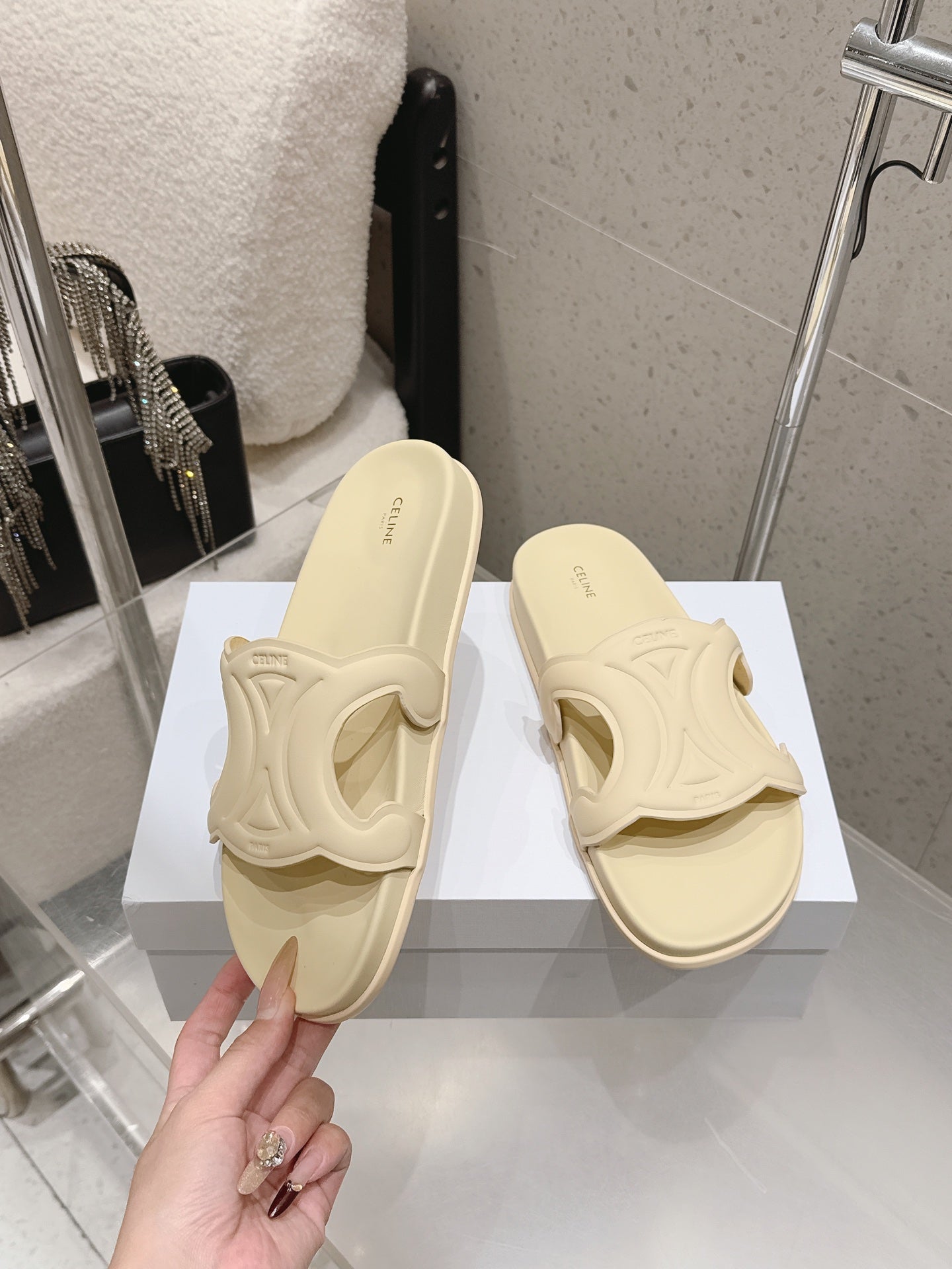 CELINE 26S TRIOMPHE SLIDES IN PASTEL YELLOW CALFSKIN