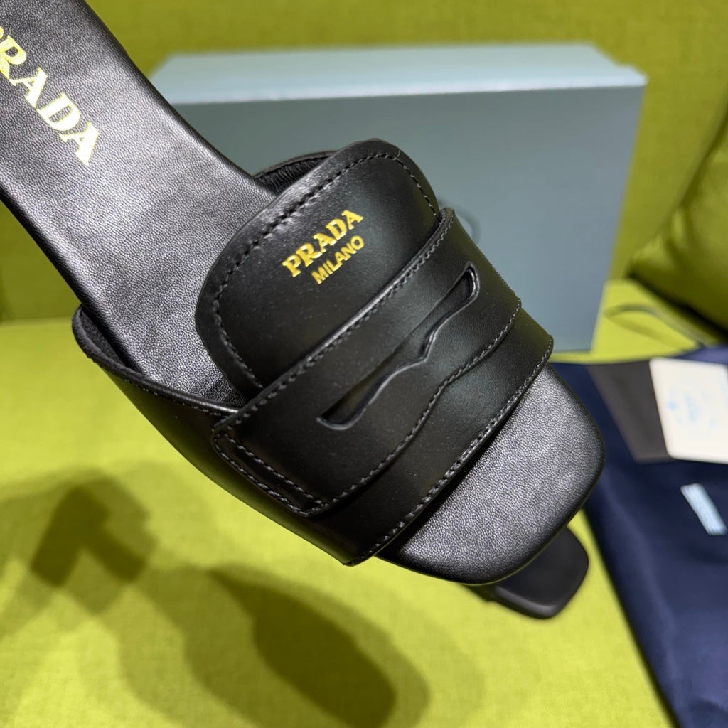 PRADA 25S SLIDES IN BLACK CALFSKIN