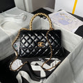 CHANEL 25S CLASSIC COCO HANDLE BAG 23 CM IN BLACK LAMBSKIN WITH GOLD HARDWARE