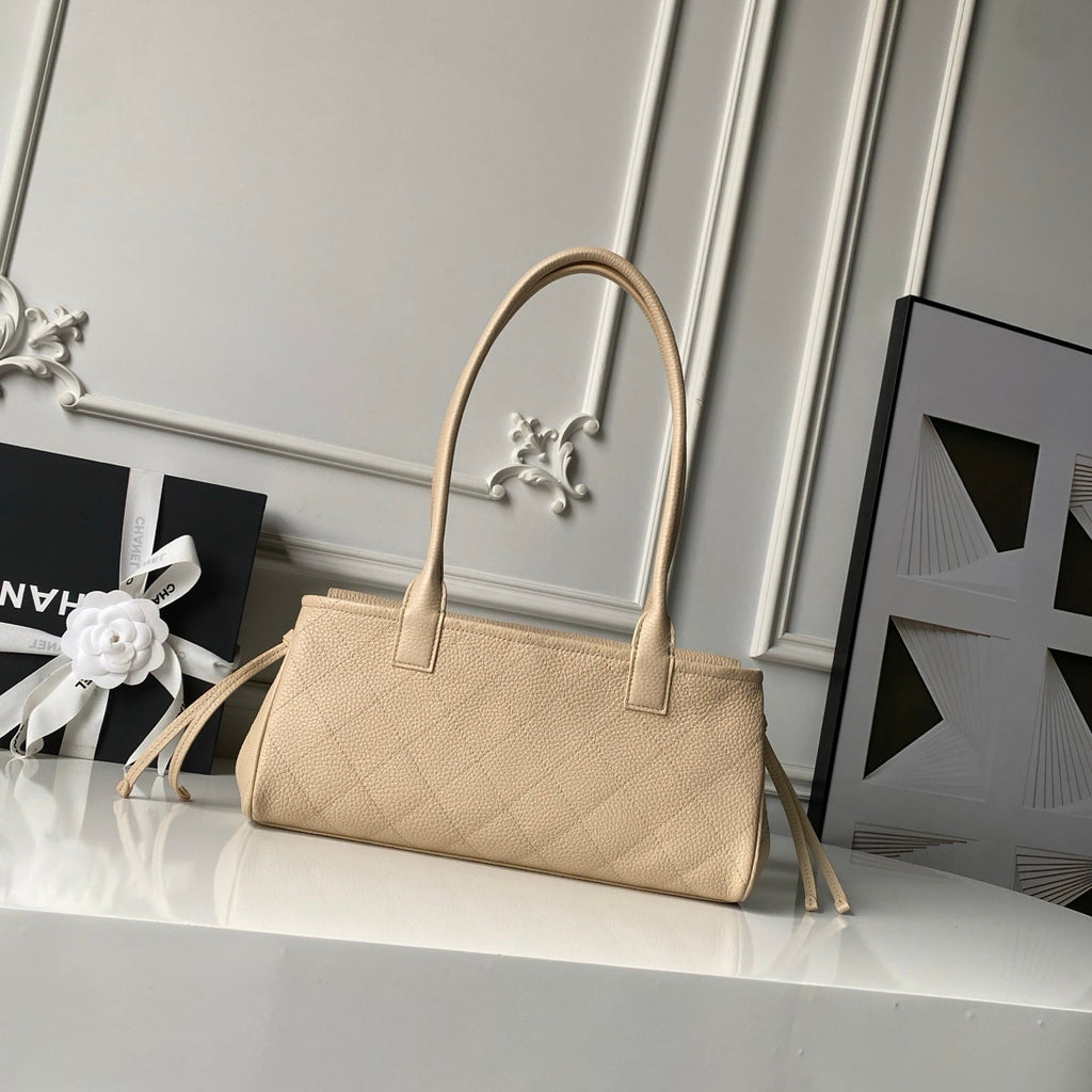 CHANEL 26S BOWLING BAGUETTE BAG 30CM IN BEIGE CAVIAR CALFSKIN