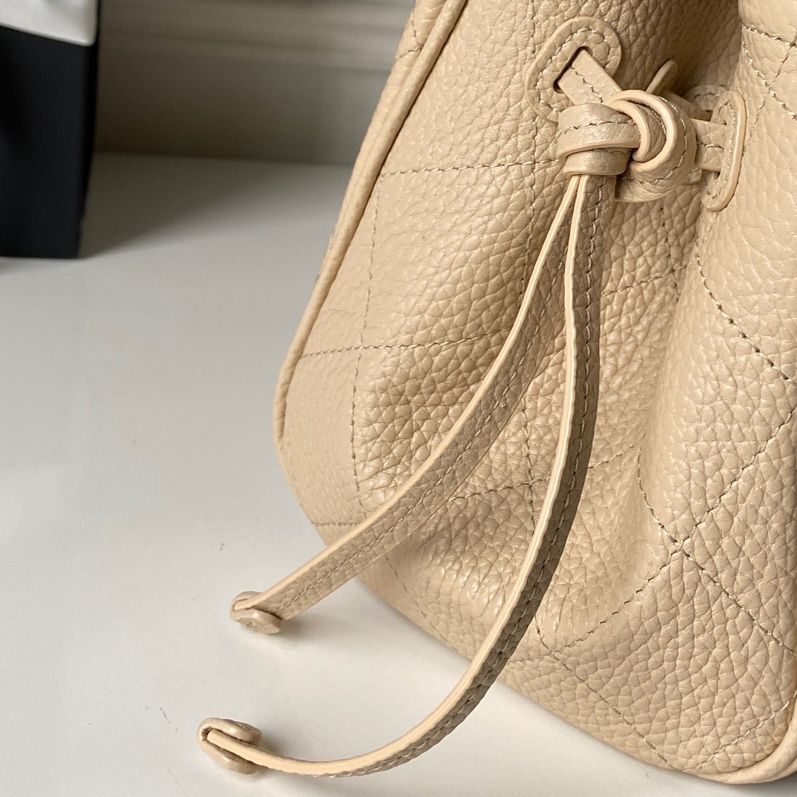 CHANEL 26S BOWLING BAGUETTE BAG 30CM IN BEIGE CAVIAR CALFSKIN