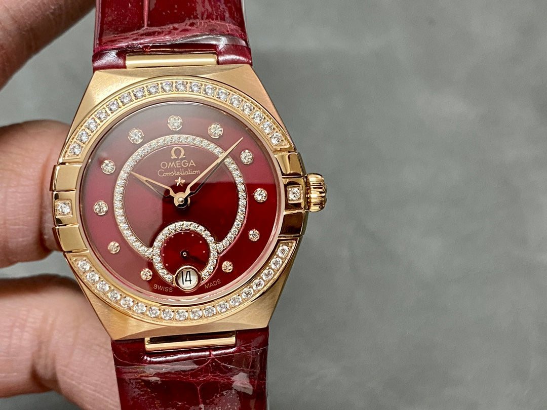 CONSTELLATION 34 MM WATCH ROSE GOLD CASE WITH WINE RED LEATHER STRAP