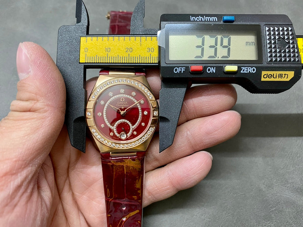CONSTELLATION 34 MM WATCH ROSE GOLD CASE WITH WINE RED LEATHER STRAP