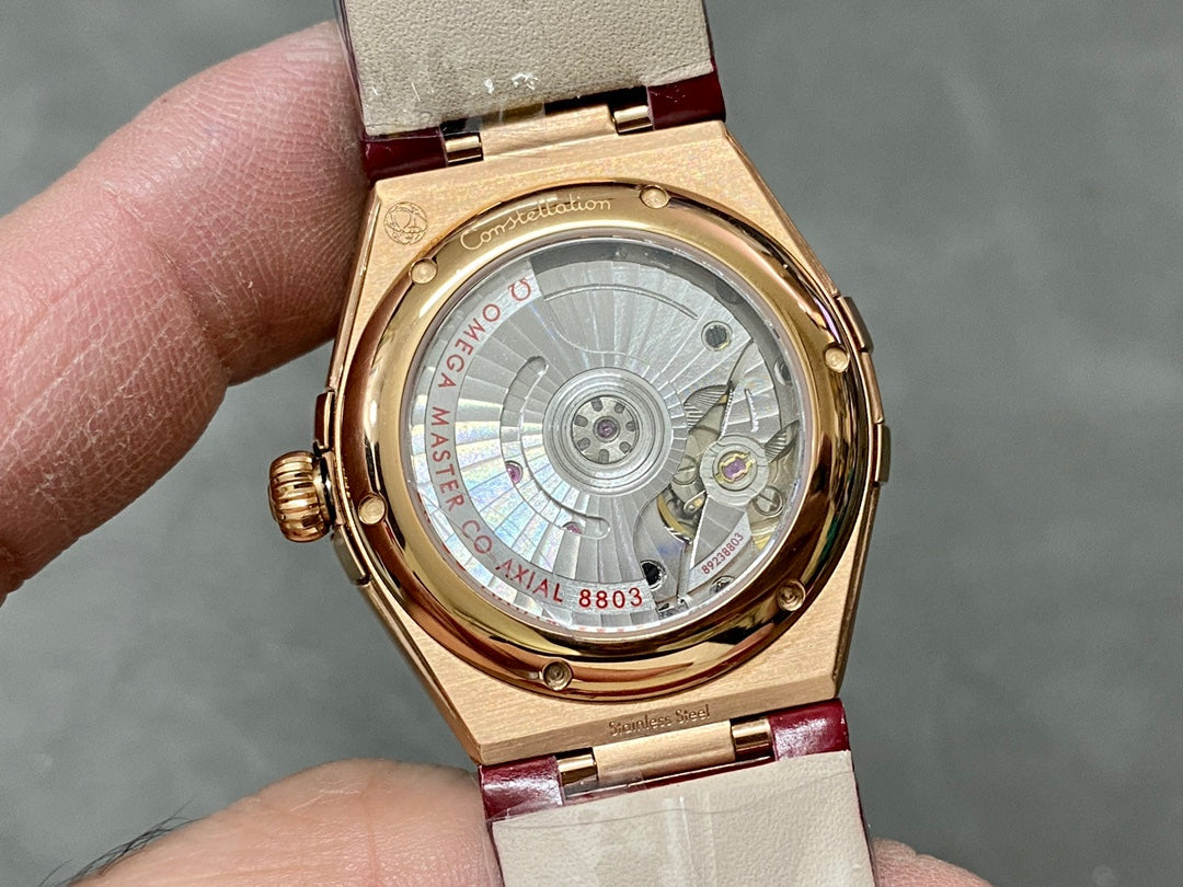 CONSTELLATION 34 MM WATCH ROSE GOLD CASE WITH WINE RED LEATHER STRAP