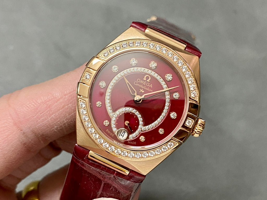 CONSTELLATION 34 MM WATCH ROSE GOLD CASE WITH WINE RED LEATHER STRAP