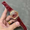 CONSTELLATION 34 MM WATCH ROSE GOLD CASE WITH WINE RED LEATHER STRAP