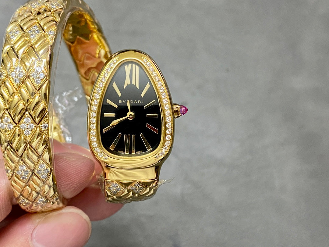 SERPENTI TUBOGAS QUARTZ YELLOW GOLD BLACK DIAL