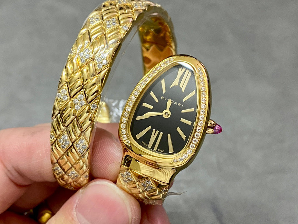 SERPENTI TUBOGAS QUARTZ YELLOW GOLD BLACK DIAL