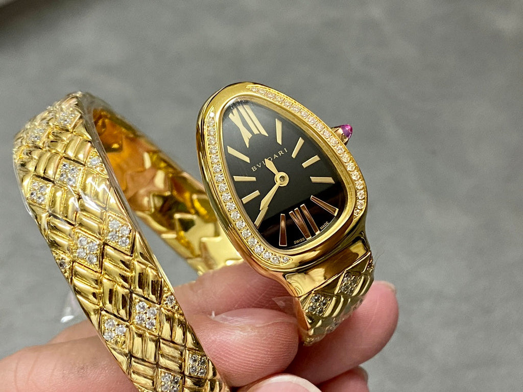 SERPENTI TUBOGAS QUARTZ YELLOW GOLD BLACK DIAL