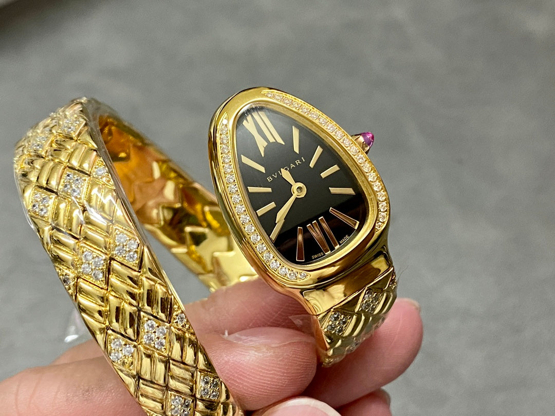 SERPENTI TUBOGAS QUARTZ YELLOW GOLD BLACK DIAL