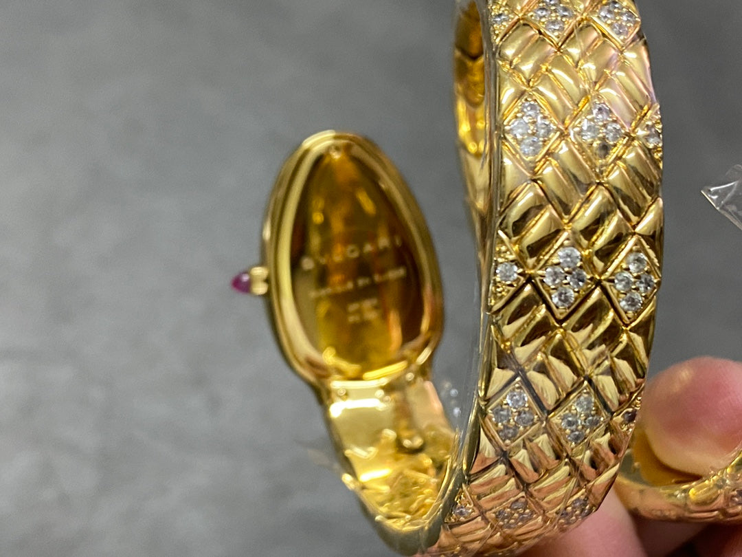 SERPENTI TUBOGAS QUARTZ YELLOW GOLD BLACK DIAL
