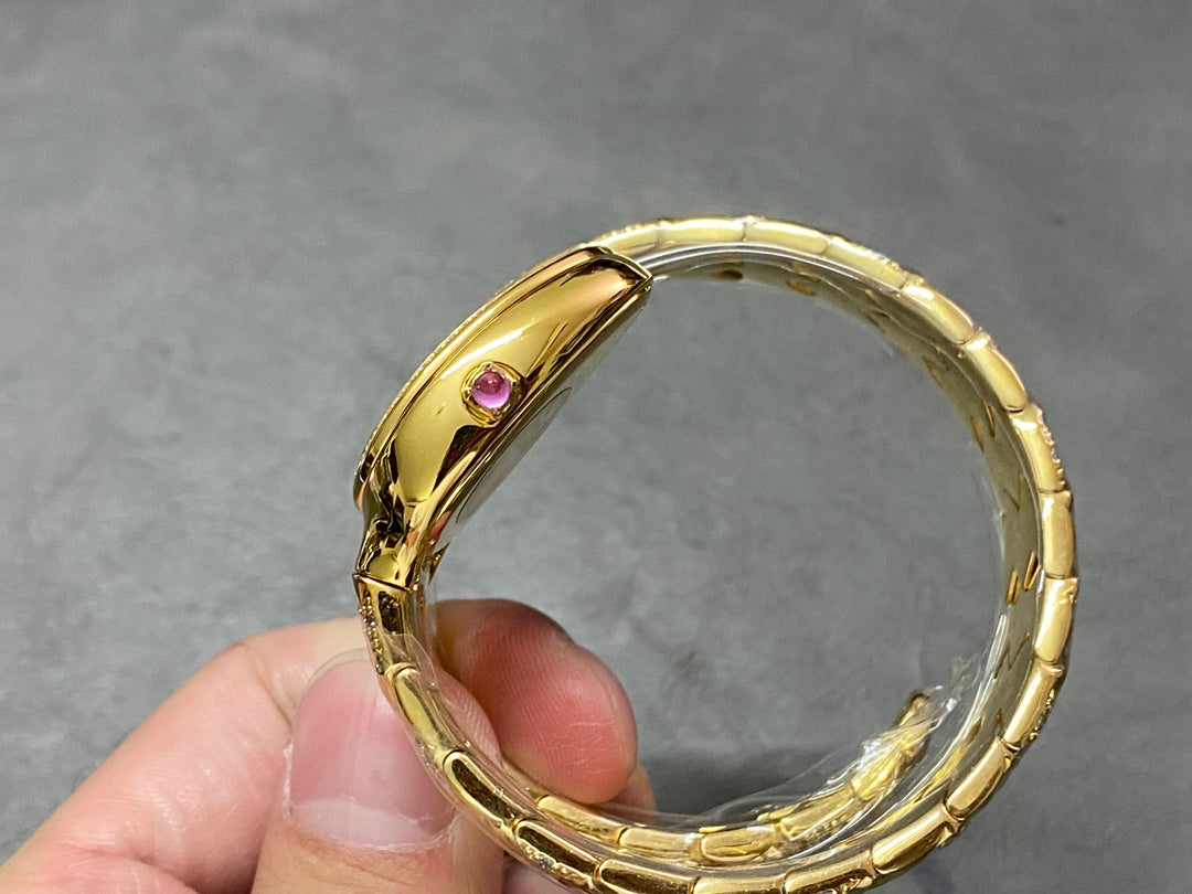 SERPENTI TUBOGAS QUARTZ YELLOW GOLD BLACK DIAL