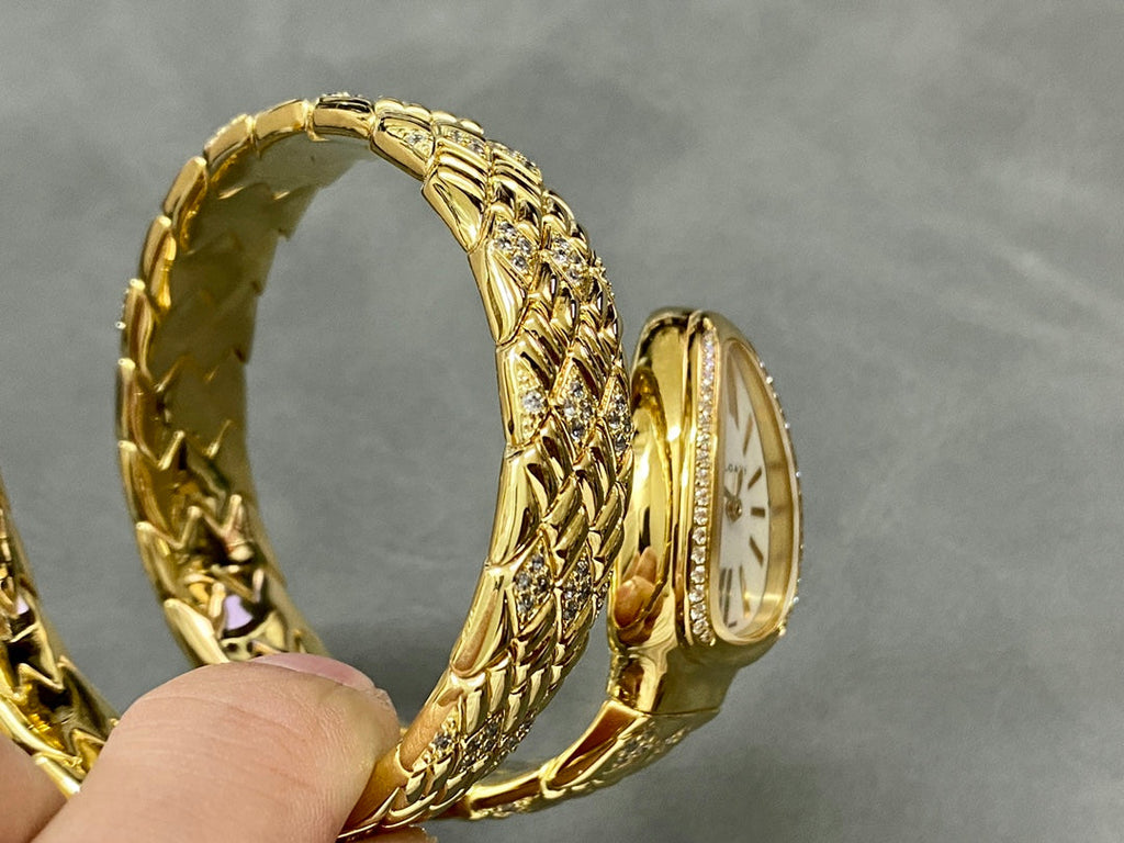 SERPENTI TUBOGAS QUARTZ YELLOW GOLD WHITE DIAL