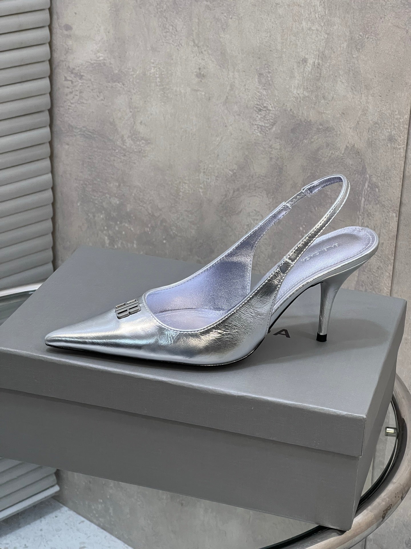 BALENCIAGA 25S HIGH-HEEL SLINGBACK 85 MM IN SILVER COW LEATHER