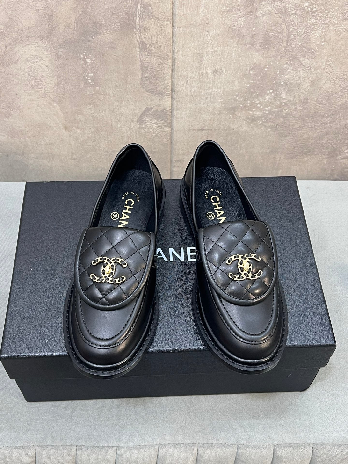 CHANEL 26S LOAFERS IN BLACK QUILTED CALFSKIN WITH CHAIN CC LOGO