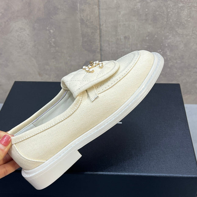 CHANEL 26S LOAFERS IN IVORY WHITE CANVAS WITH QUILTED FLAP & CHAIN CC LOGO