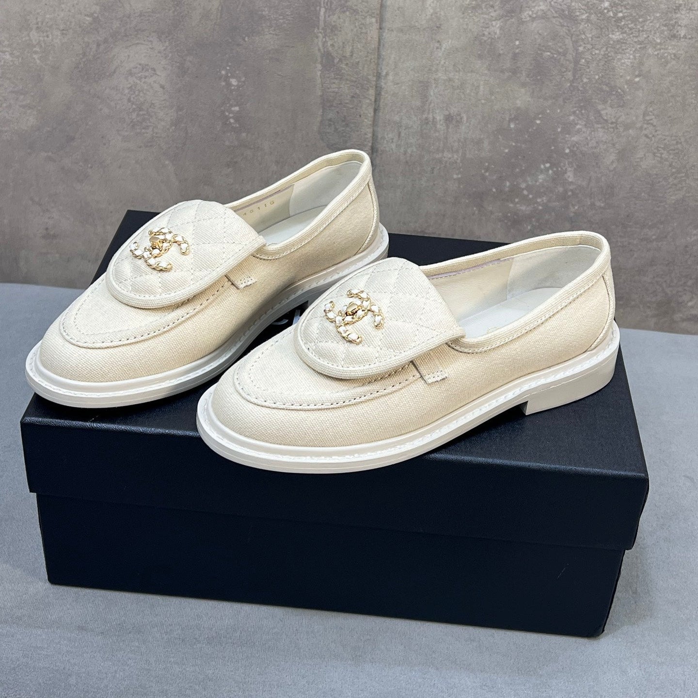CHANEL 26S LOAFERS IN IVORY WHITE CANVAS WITH QUILTED FLAP & CHAIN CC LOGO