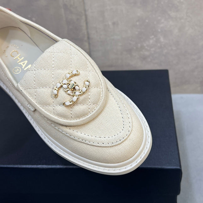 CHANEL 26S LOAFERS IN IVORY WHITE CANVAS WITH QUILTED FLAP & CHAIN CC LOGO