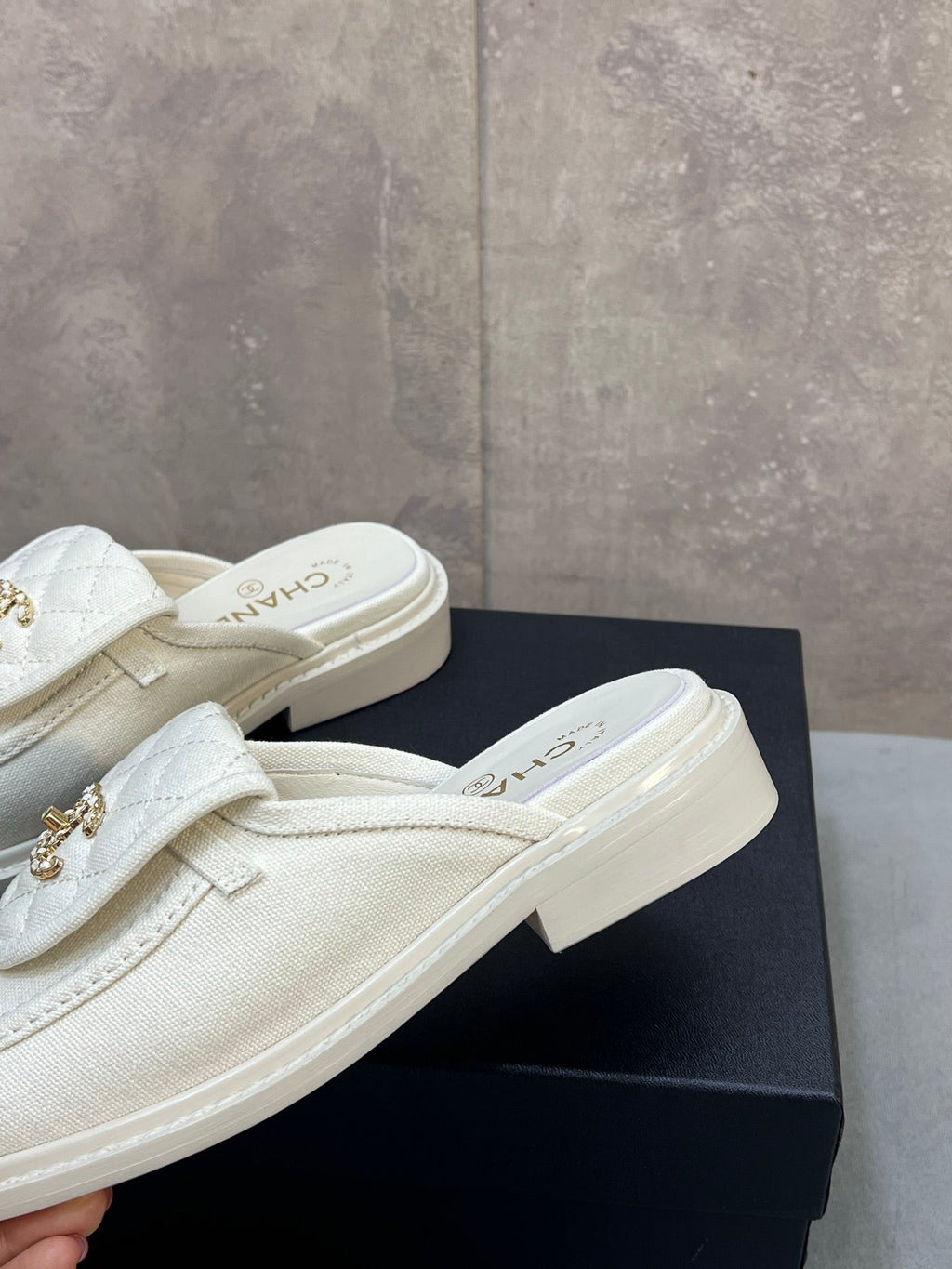 CHANEL 26S MULE LOAFERS IN WHITE CANVAS WITH QUILTED FLAP & CC LOGO