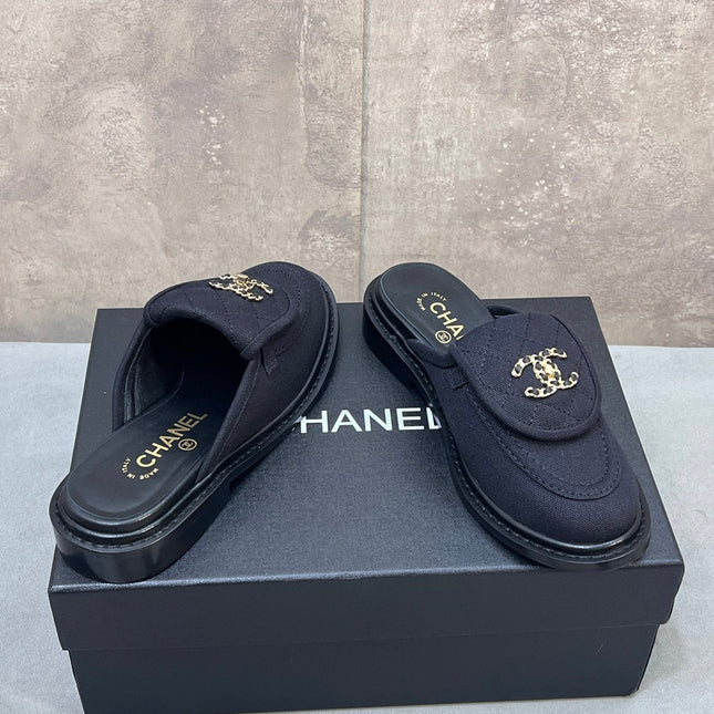 CHANEL 26S MULE LOAFERS IN BLACK CANVAS WITH QUILTED FLAP & CHAIN CC LOGO