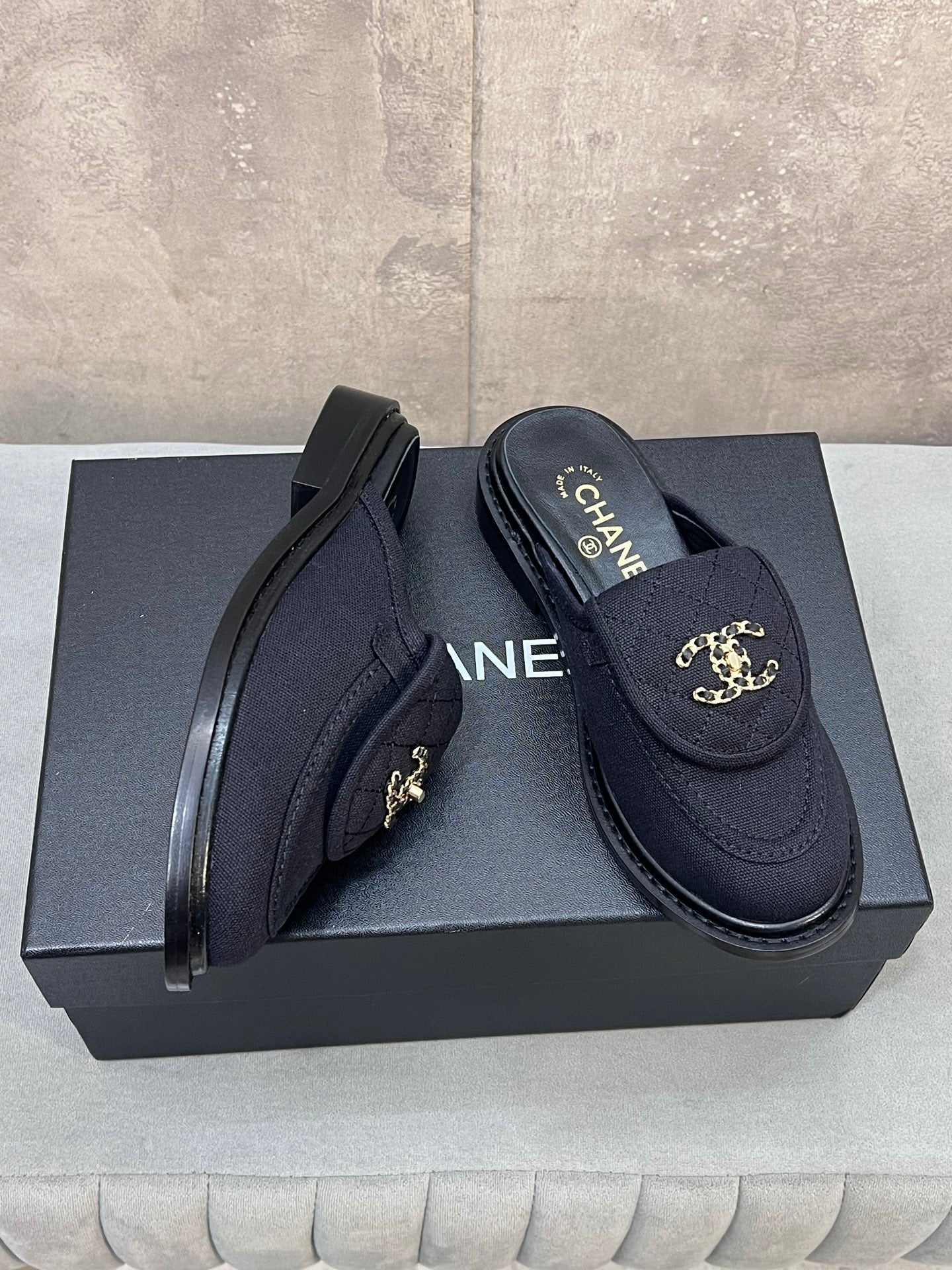 CHANEL 26S MULE LOAFERS IN BLACK CANVAS WITH QUILTED FLAP & CHAIN CC LOGO