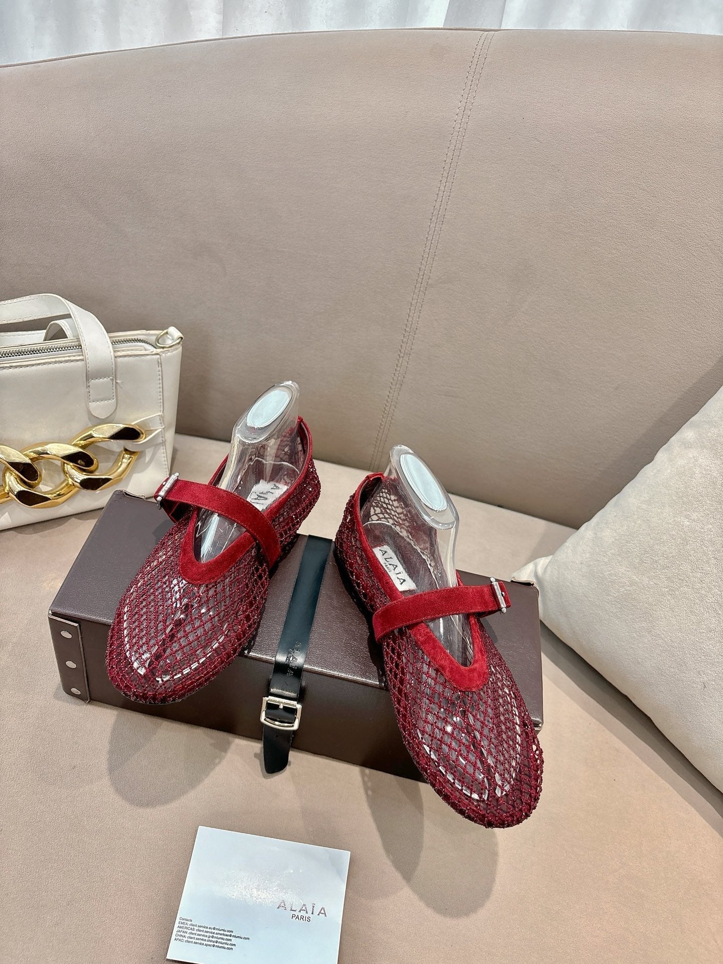ALAIA 26S MESH FLATS IN DARK RED SUEDE