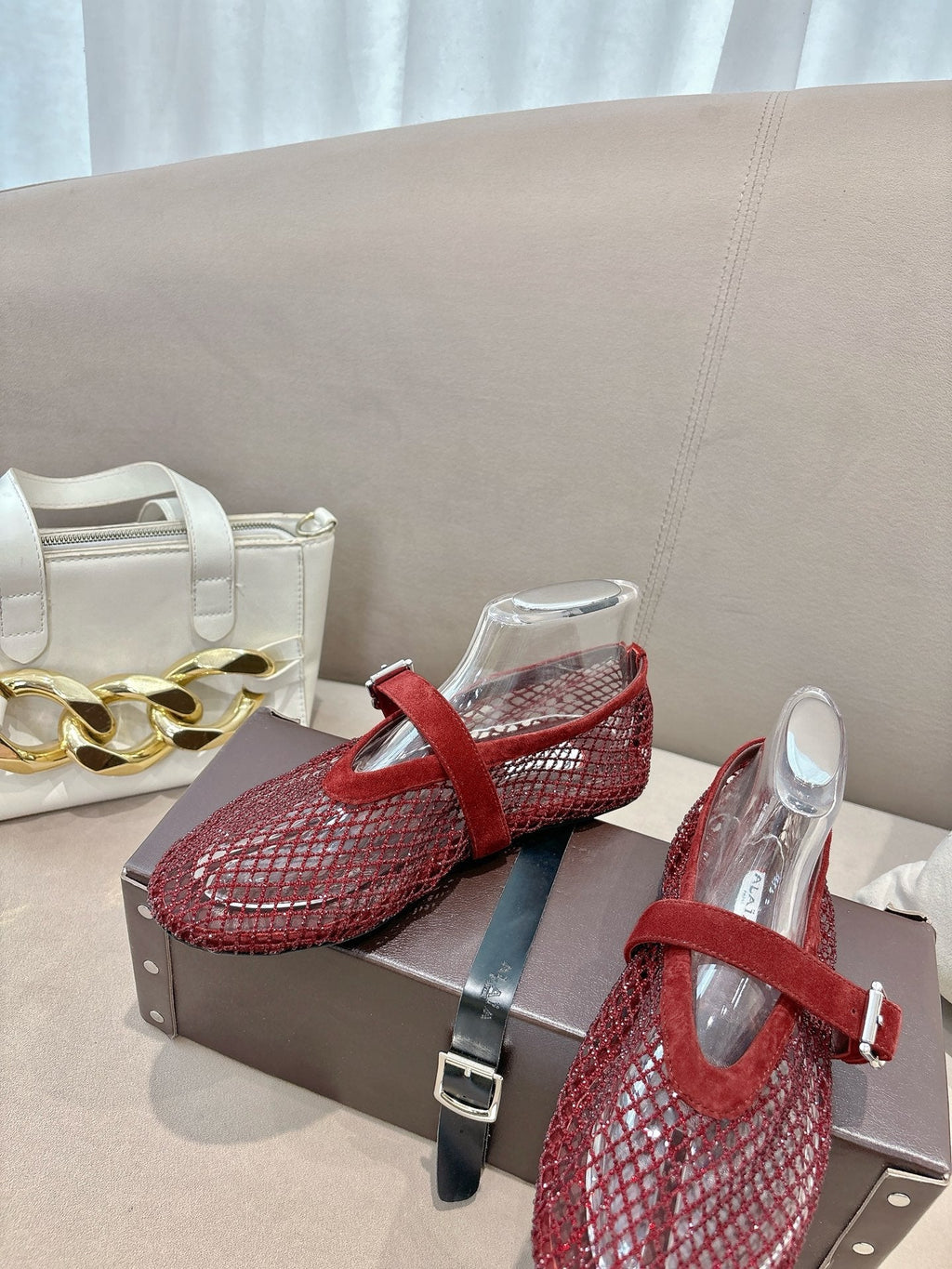 ALAIA 26S MESH FLATS IN DARK RED SUEDE