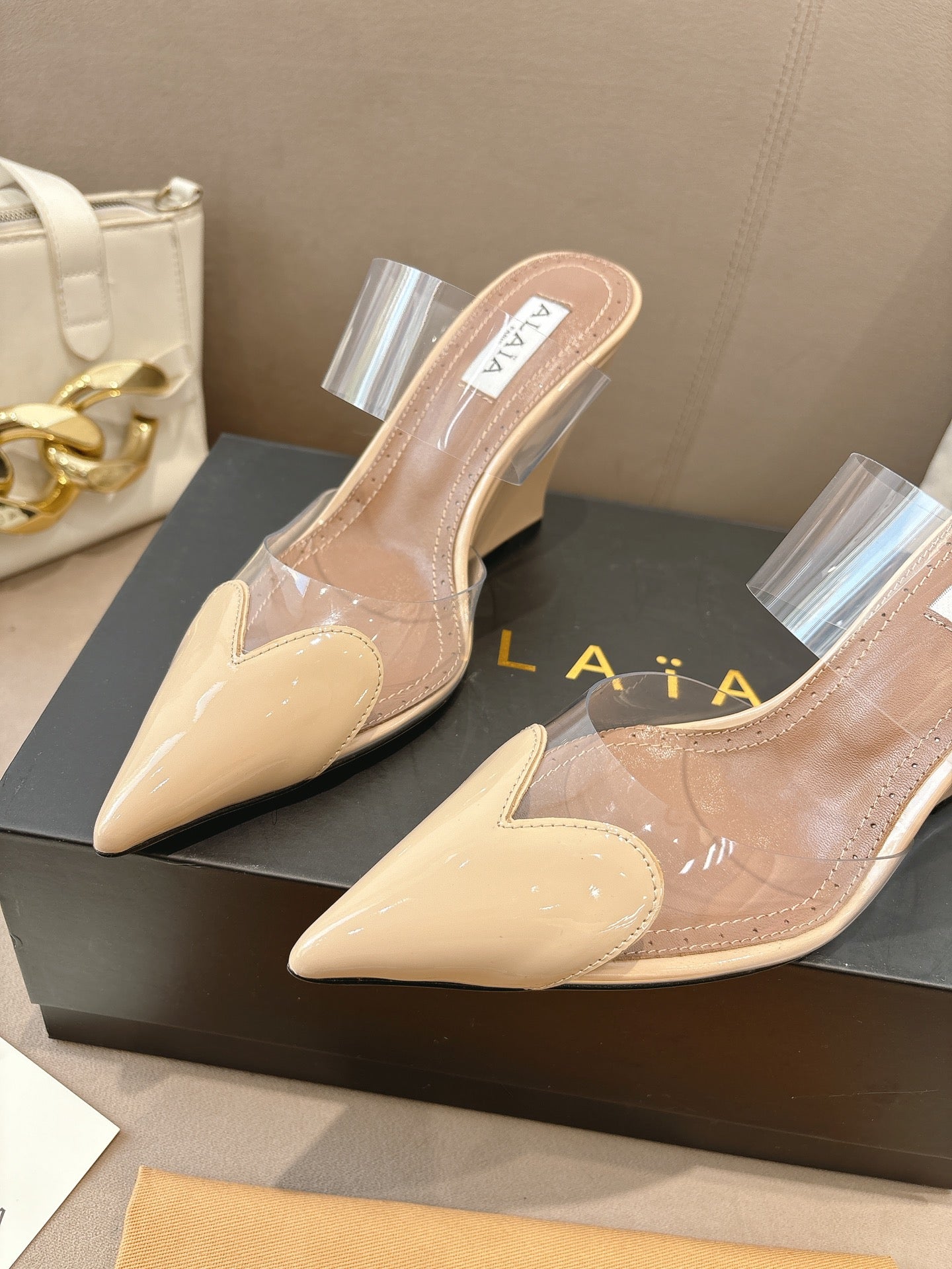 ALAIA 26S HIGH-HEEL WEDGE MULES 95 MM IN BEIGE GLOSSY CALFSKIN