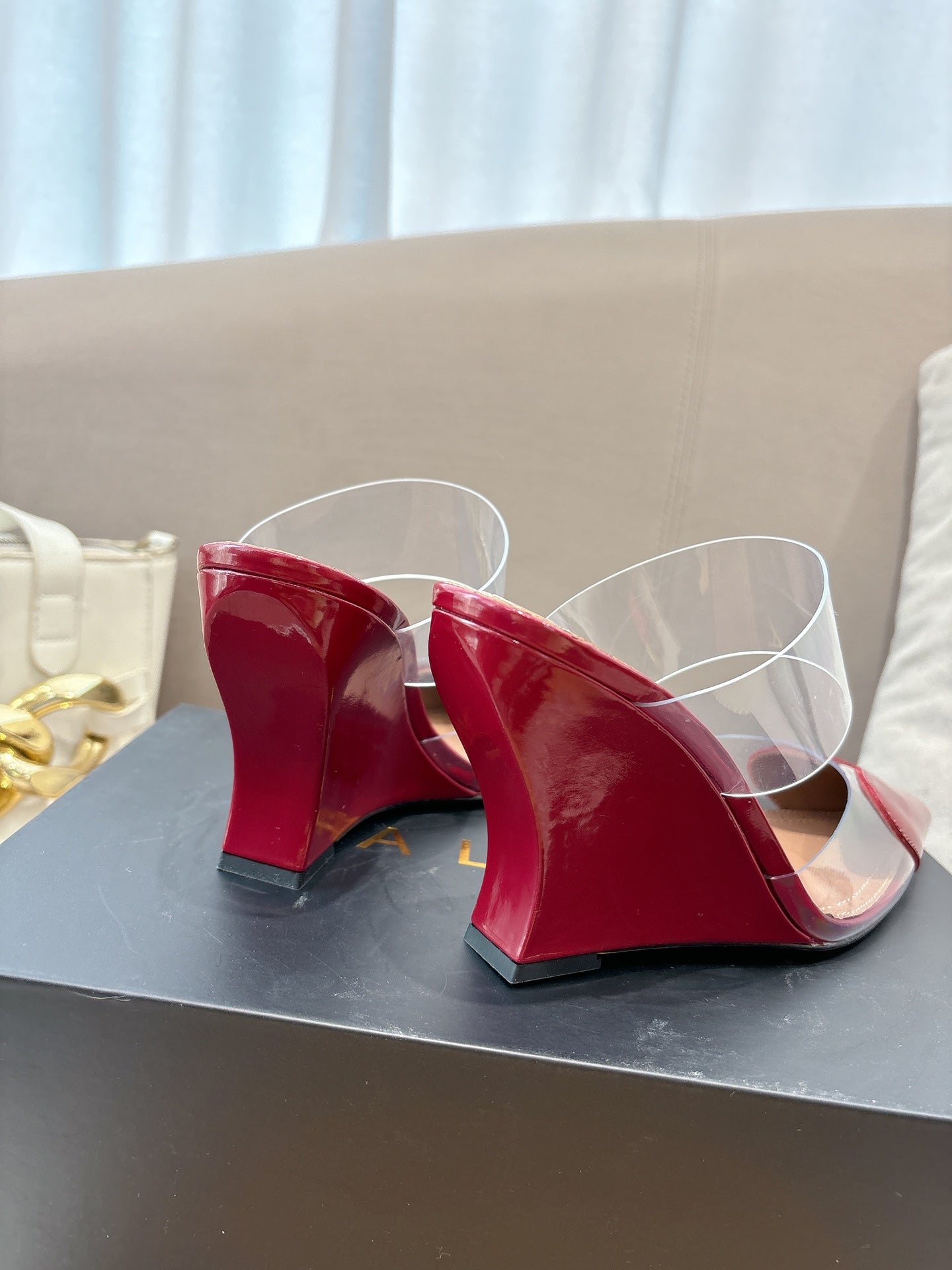 ALAIA 26S HIGH-HEEL WEDGE MULES 95 MM IN DARK RED GLOSSY CALFSKIN