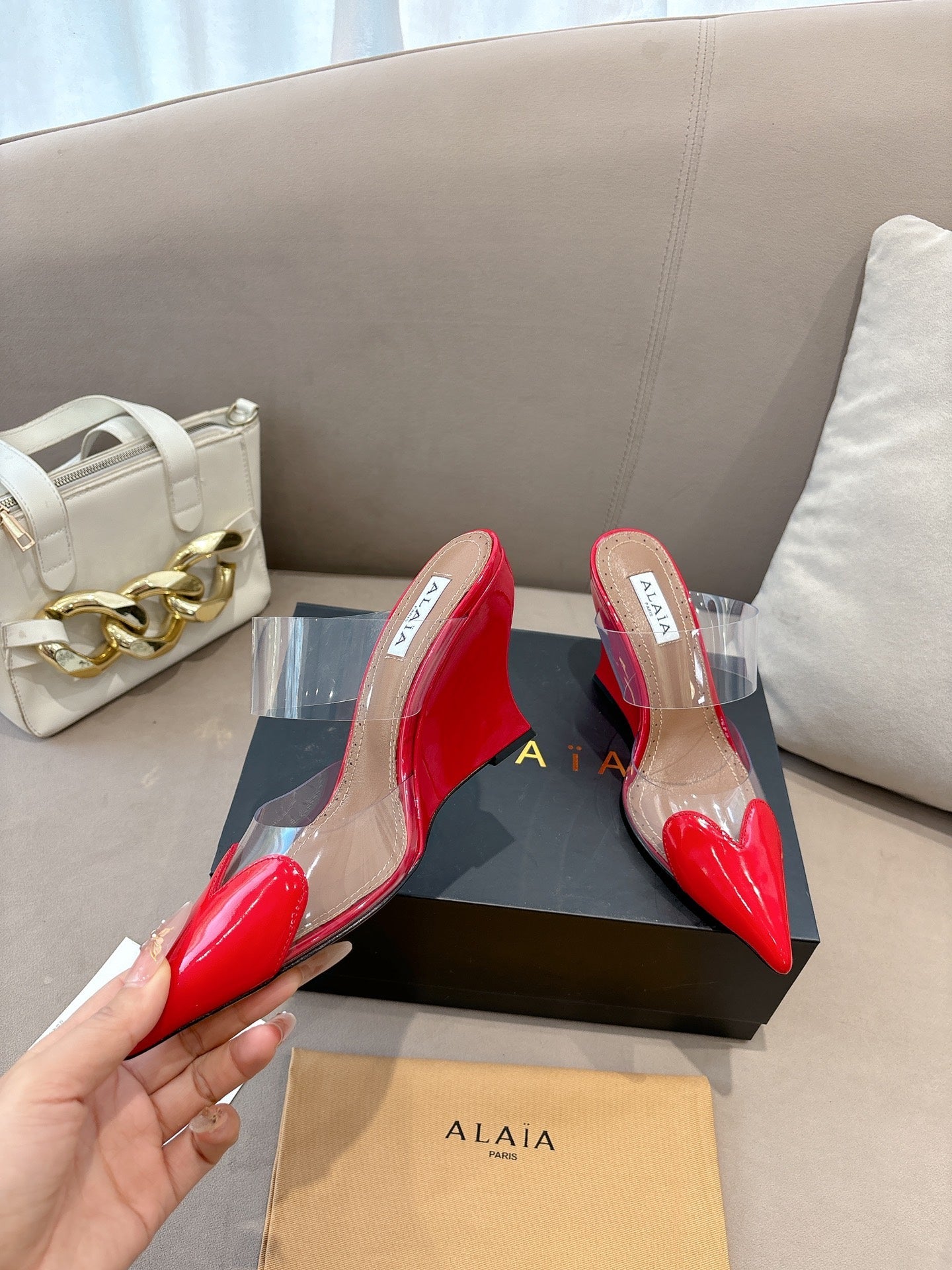 ALAIA 26S HIGH-HEEL WEDGE MULES 95 MM IN RED GLOSSY CALFSKIN