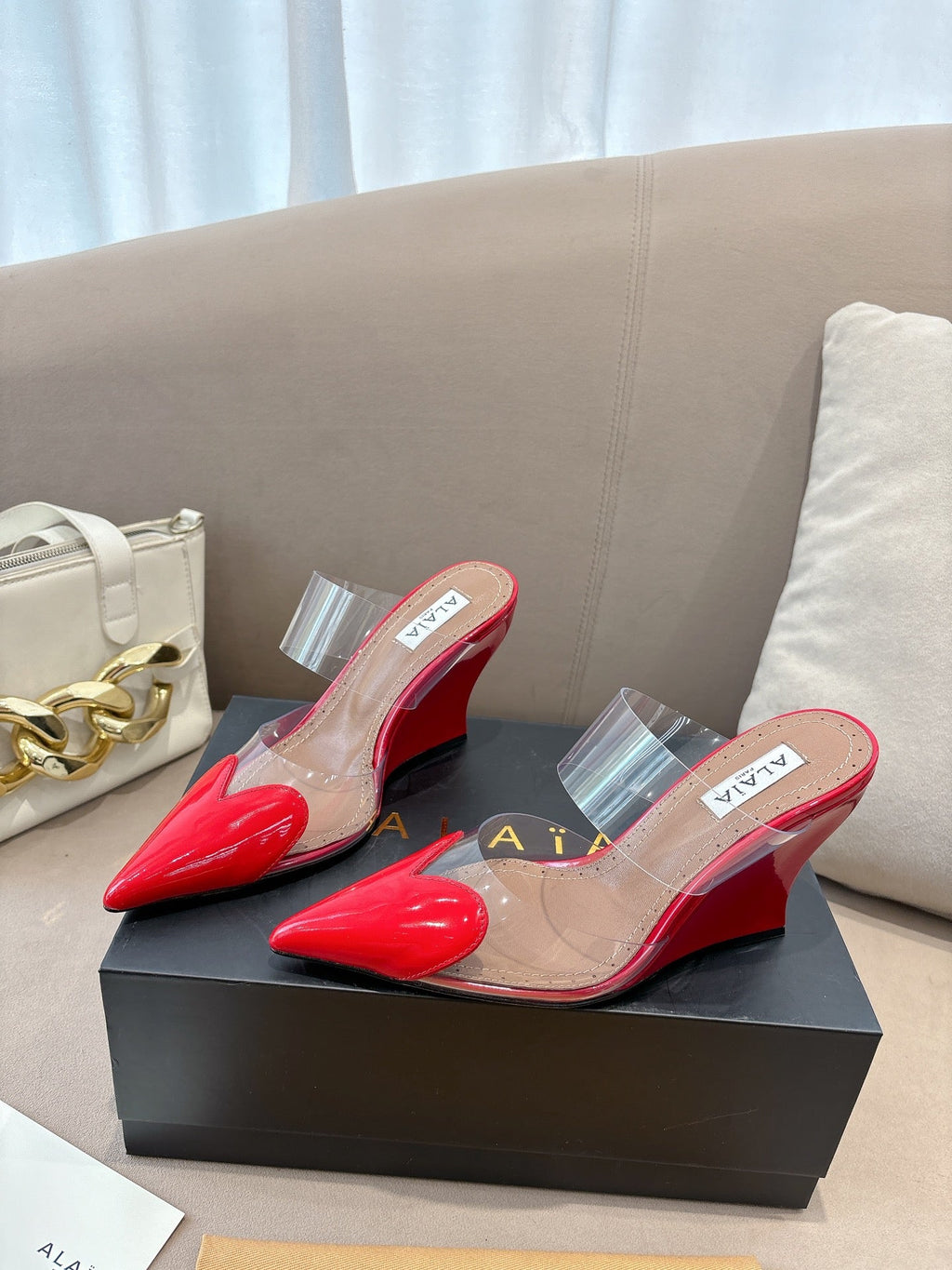 ALAIA 26S HIGH-HEEL WEDGE MULES 95 MM IN RED GLOSSY CALFSKIN