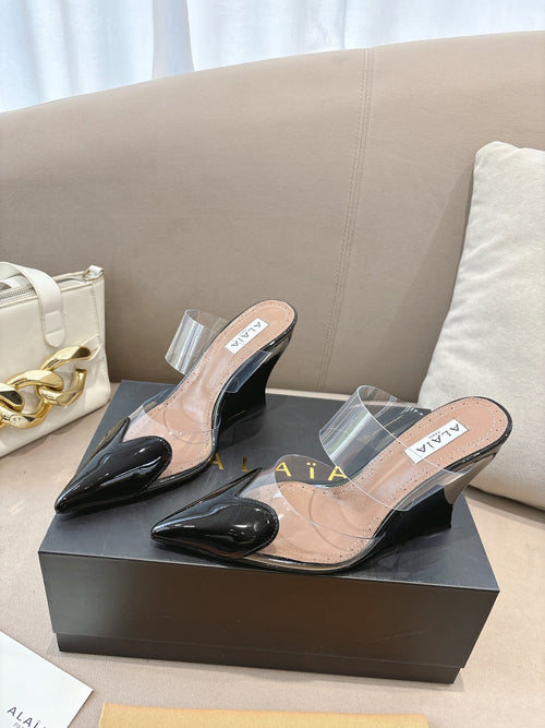 ALAIA 26S HIGH-HEEL WEDGE MULES 95 MM IN BLACK GLOSSY CALFSKIN