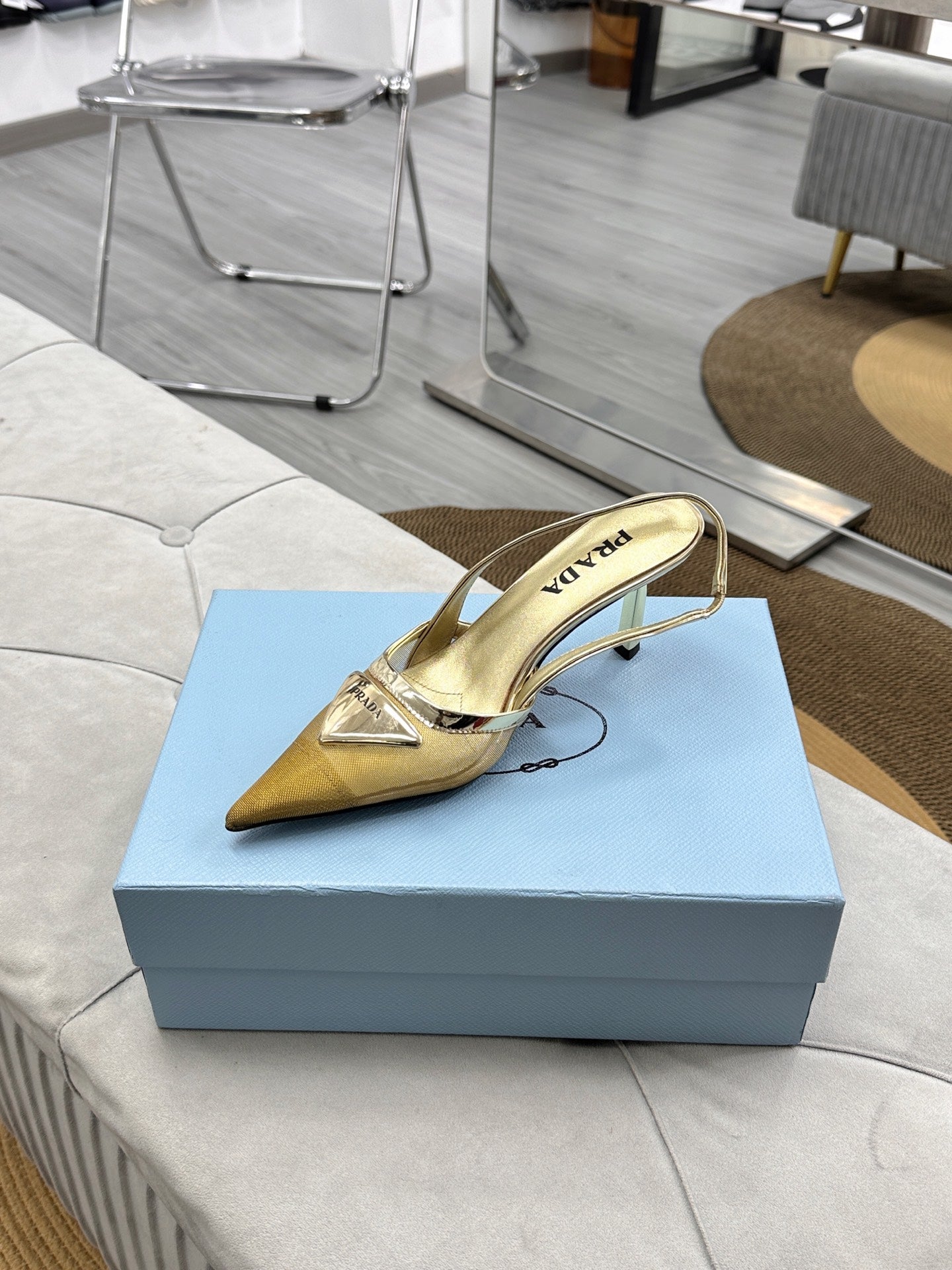 PRADA 25S TRIANGLE LOGO SLINGBACK PUMPS IN GOLD MESH FABRIC