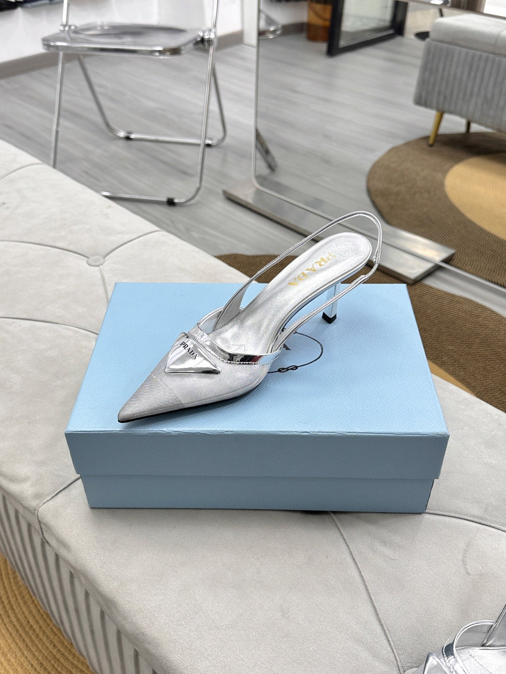 PRADA 25S TRIANGLE LOGO SLINGBACK PUMPS IN SILVER MESH FABRIC