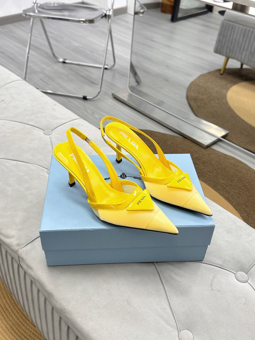 PRADA 25S TRIANGLE LOGO SLINGBACK PUMPS IN YELLOW MESH FABRIC