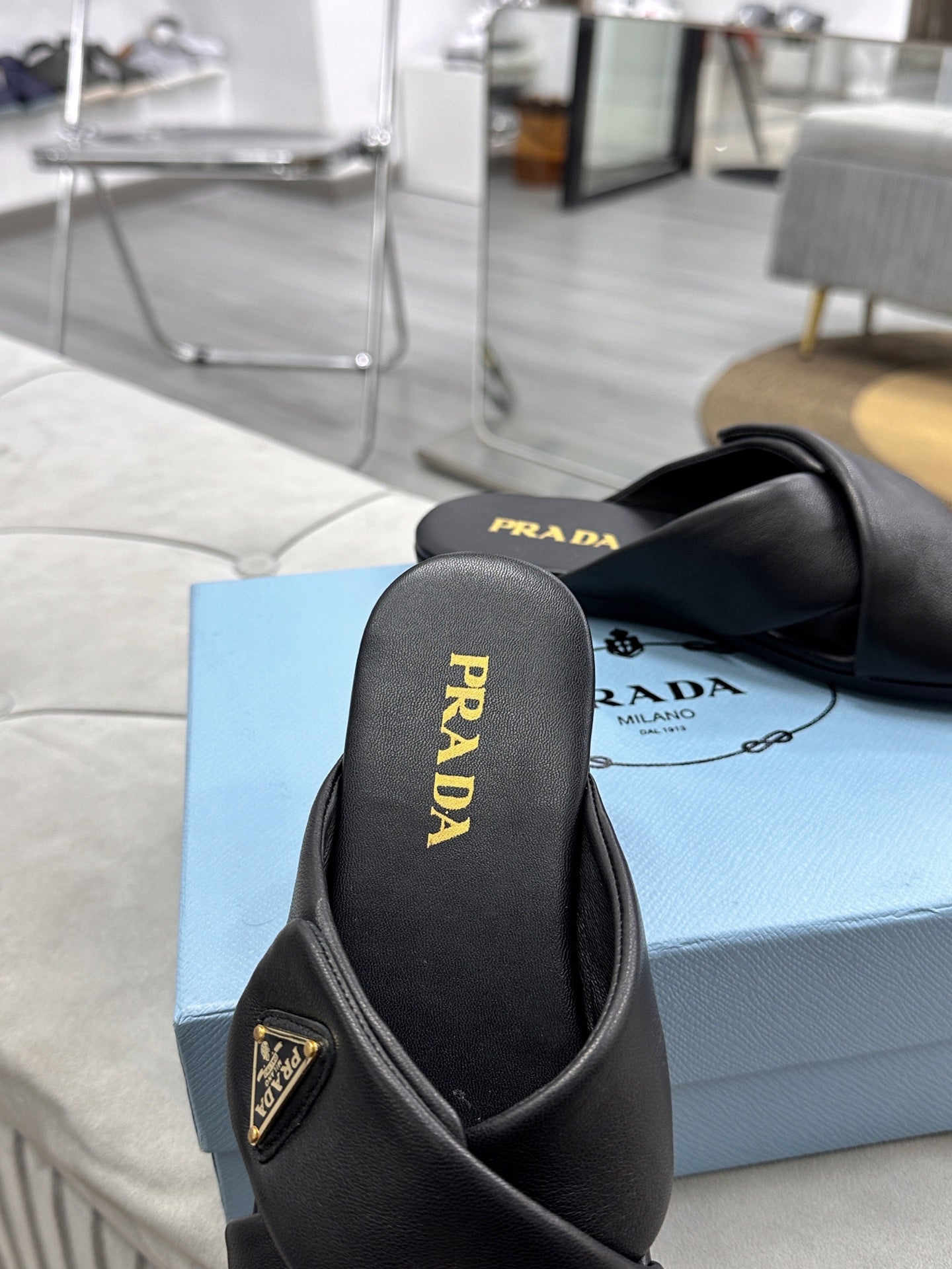 PRADA 25S SLIDE SANDALS IN BLACK CALFSKIN LOGO