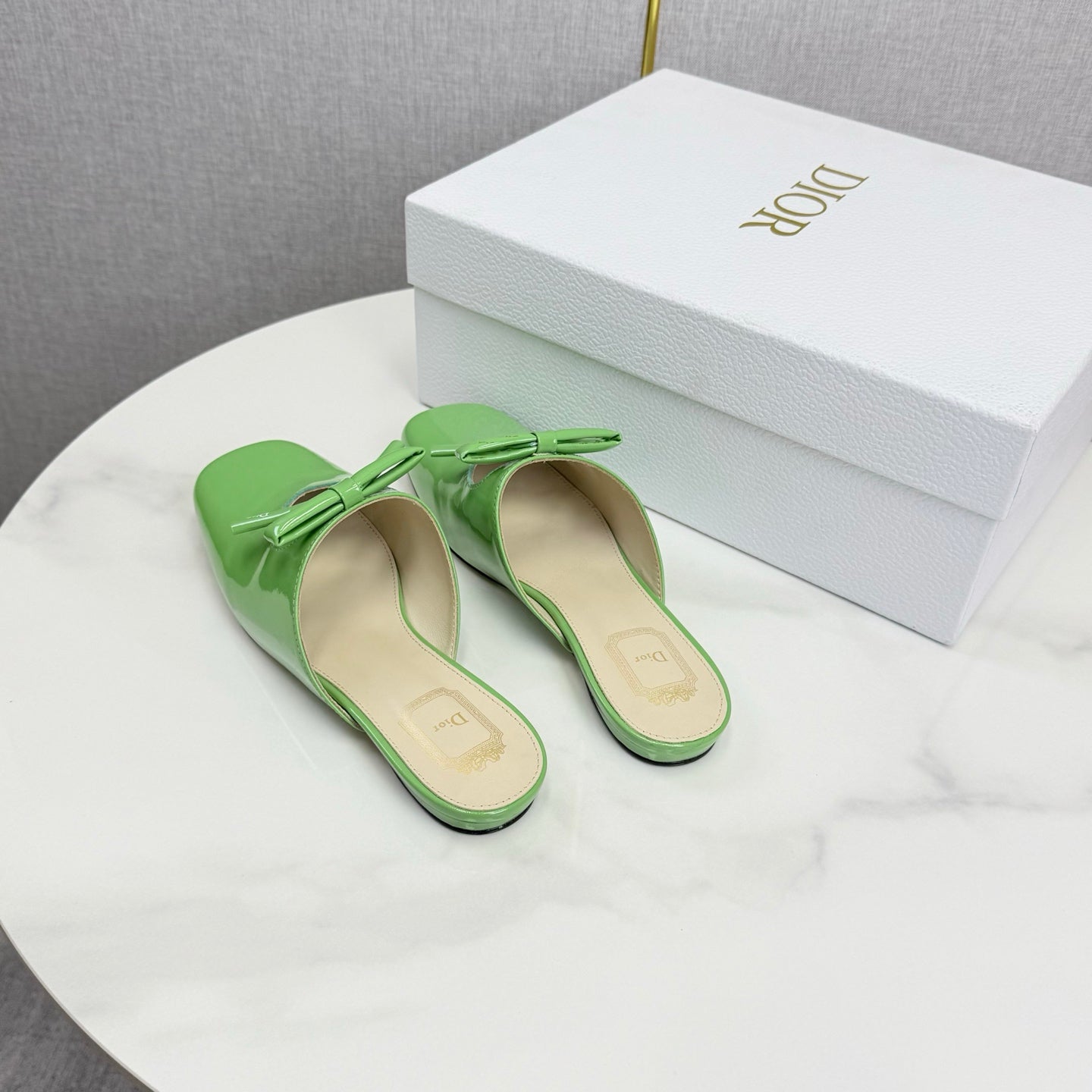 DIOR 26S PEARL-ACCENT BOW FLAT MULES IN FRESH GREEN GLOSSY CALFSKIN