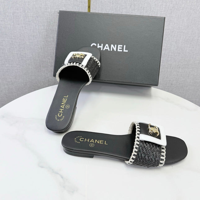 CHANEL 26S WOVEN STRAP SLIDES IN BLACK LAMBSKIN