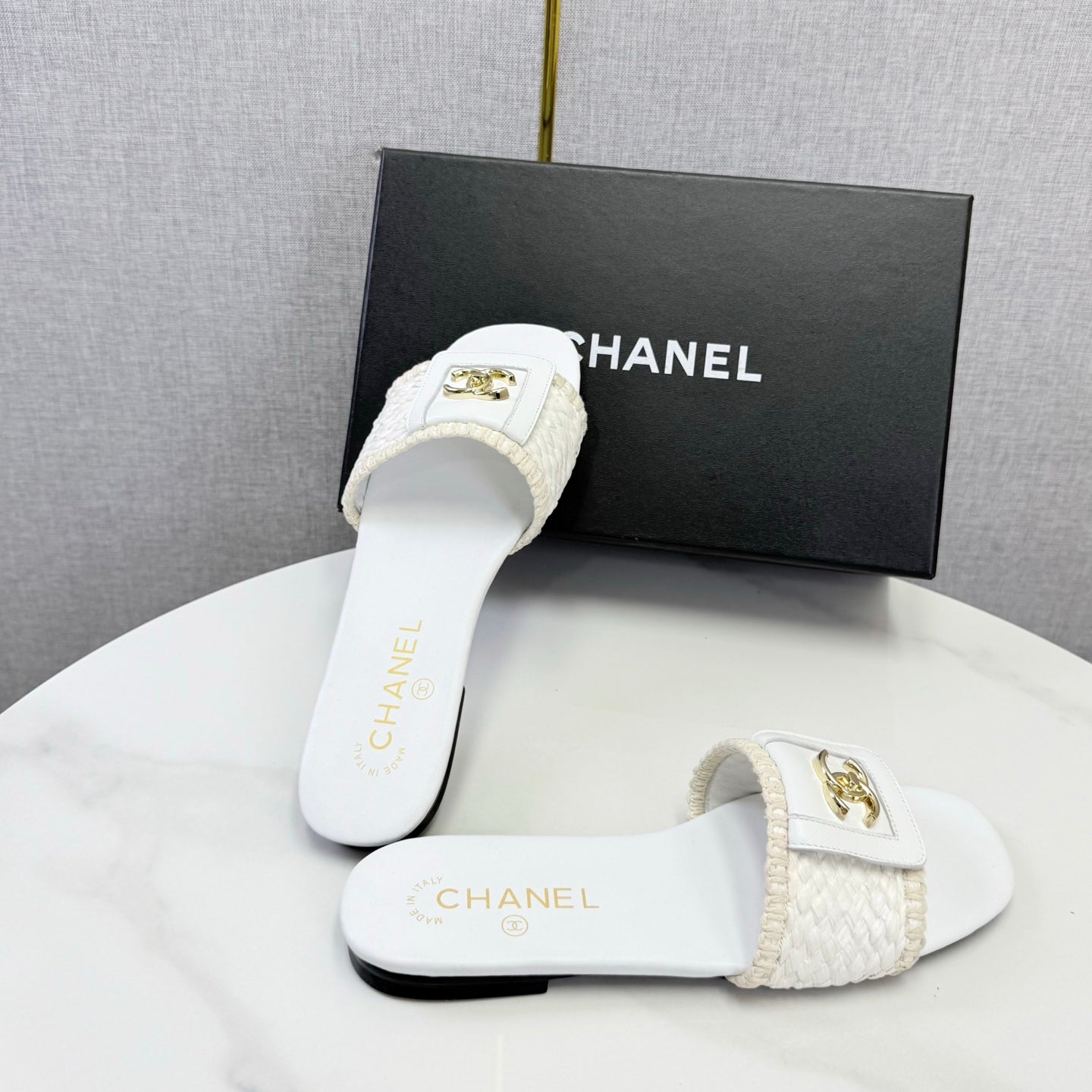 CHANEL 26S WOVEN STRAP SLIDES IN WHITE LAMBSKIN