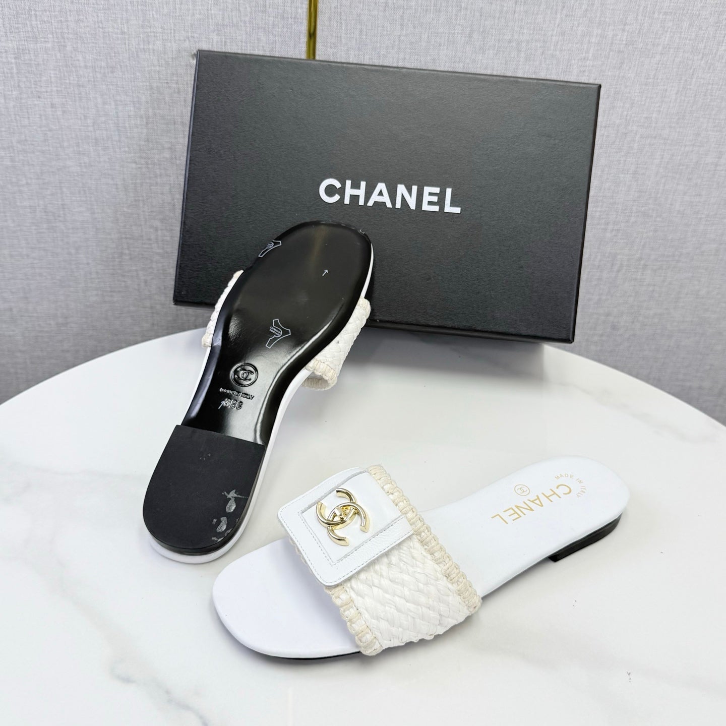 CHANEL 26S WOVEN STRAP SLIDES IN WHITE LAMBSKIN
