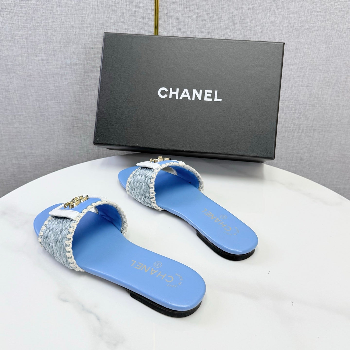 CHANEL 26S WOVEN STRAP SLIDES IN SKY BLUE LAMBSKIN